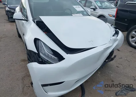 2023 Tesla Model Y from USA, damaged, VIN 7SAYGDEE4PA044024